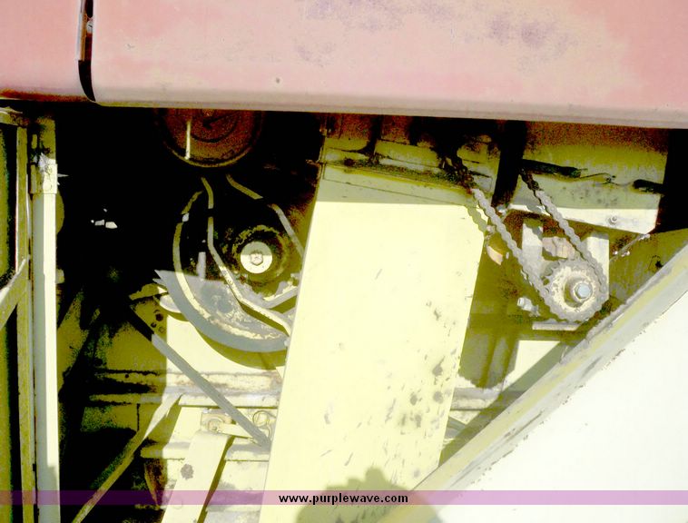 image for item 7528 New Holland TR70 combine with 20' platform with finger reel