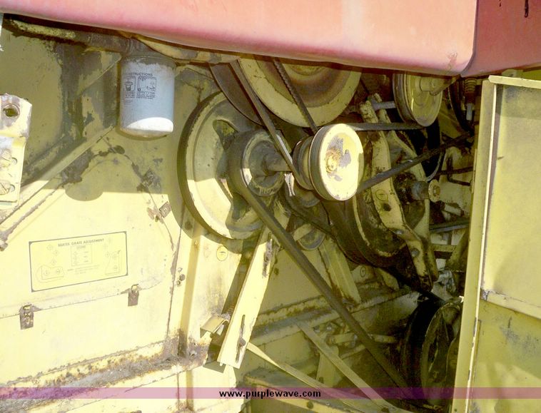 image for item 7528 New Holland TR70 combine with 20' platform with finger reel