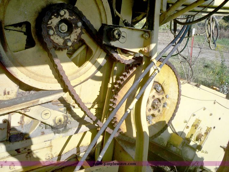 image for item 7528 New Holland TR70 combine with 20' platform with finger reel