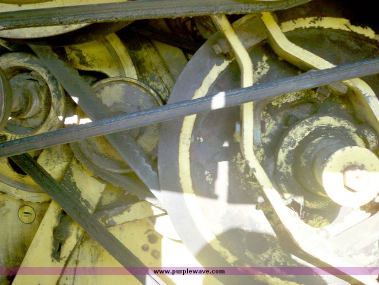 image for item 7528 New Holland TR70 combine with 20' platform with finger reel