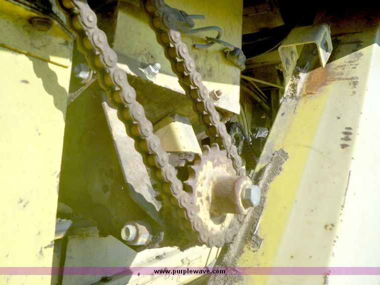 image for item 7528 New Holland TR70 combine with 20' platform with finger reel