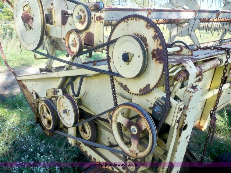 image for item 7528 New Holland TR70 combine with 20' platform with finger reel