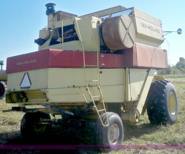 image for item 7531 New Holland TR70 combine with 20' platform with finger reel