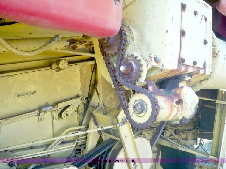 image for item 7531 New Holland TR70 combine with 20' platform with finger reel