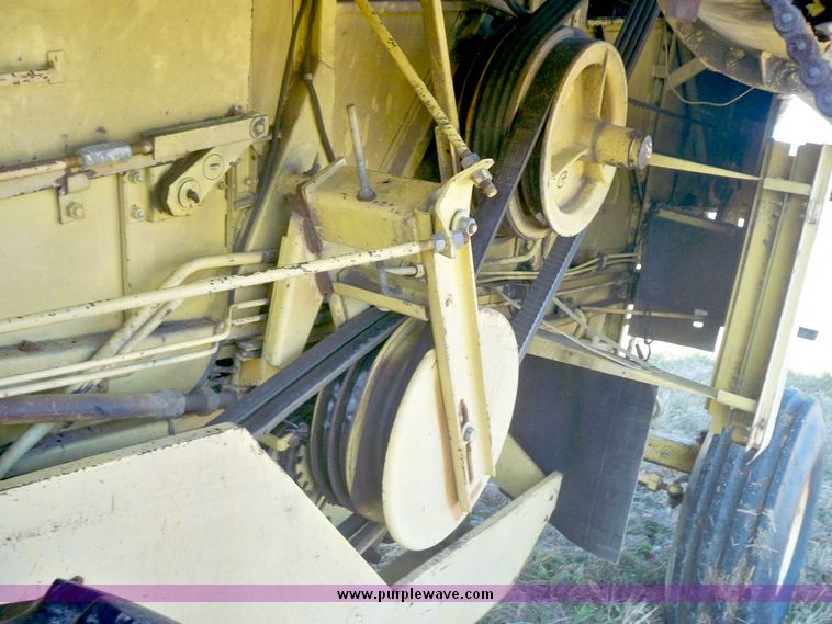 image for item 7531 New Holland TR70 combine with 20' platform with finger reel