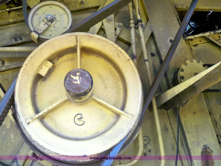 image for item 7531 New Holland TR70 combine with 20' platform with finger reel