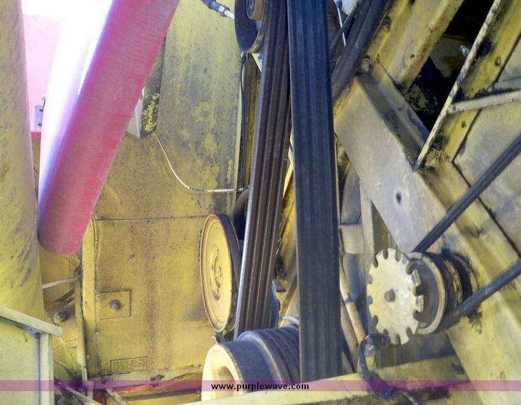 image for item 7531 New Holland TR70 combine with 20' platform with finger reel