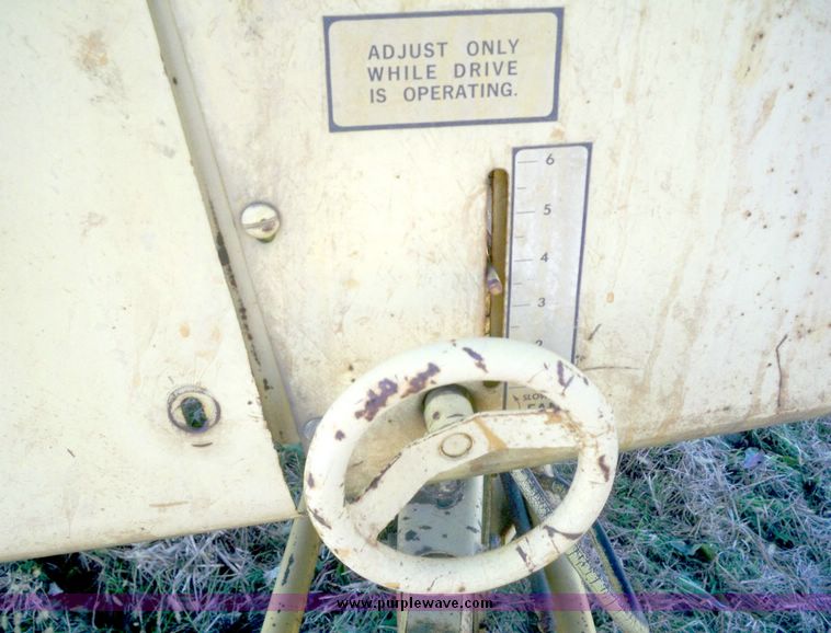 image for item 7531 New Holland TR70 combine with 20' platform with finger reel