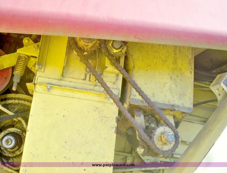 image for item 7531 New Holland TR70 combine with 20' platform with finger reel