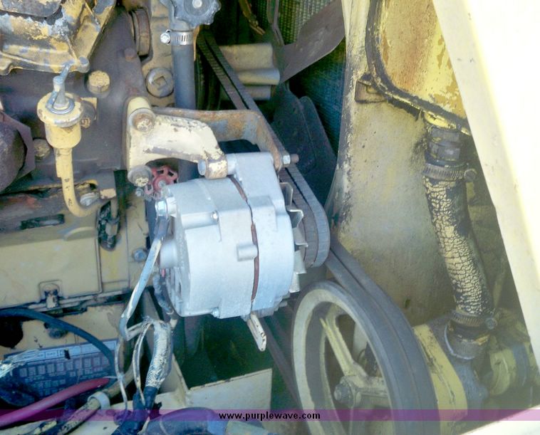 image for item 7531 New Holland TR70 combine with 20' platform with finger reel