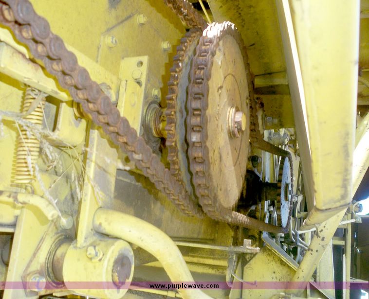 image for item 7531 New Holland TR70 combine with 20' platform with finger reel