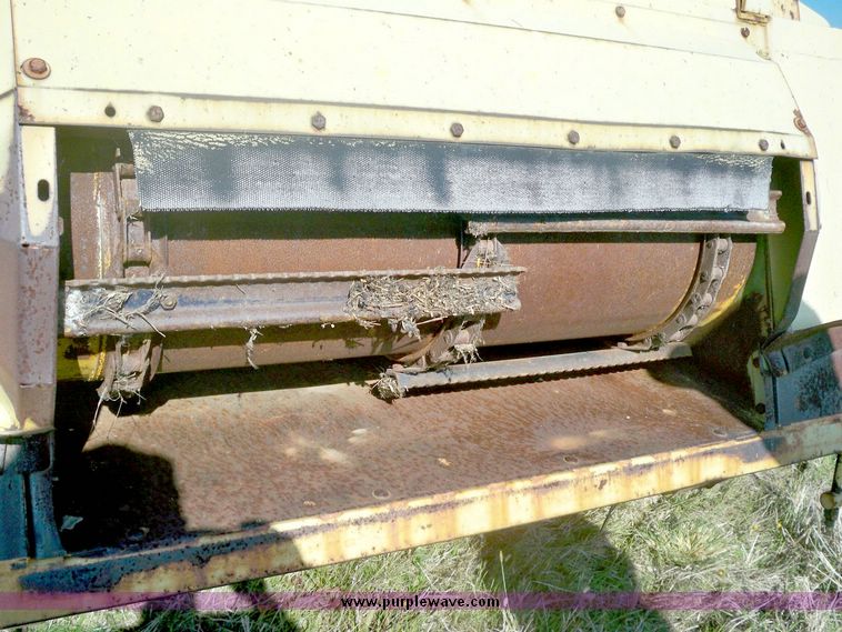 image for item 7531 New Holland TR70 combine with 20' platform with finger reel