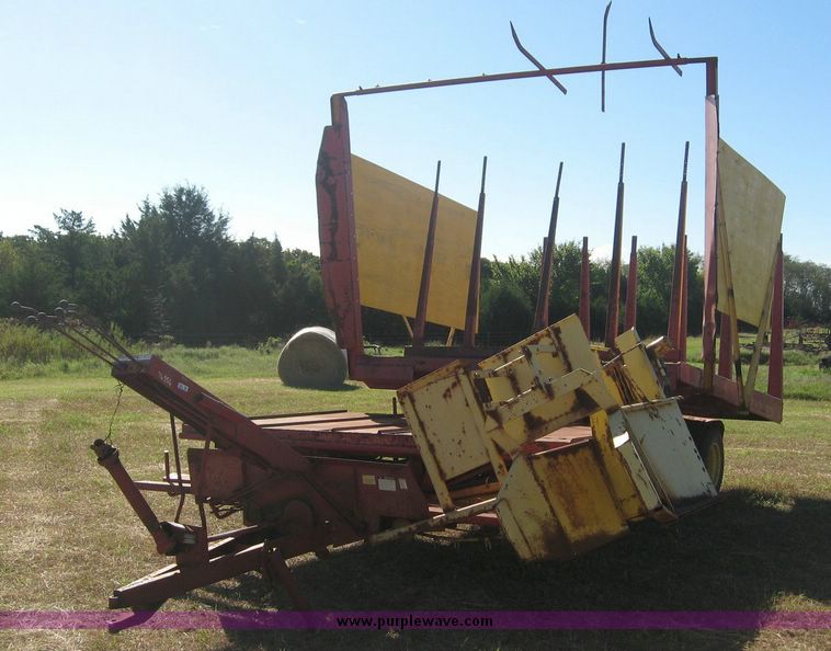 image for item 7999 New Holland 1033 pull type stack hand