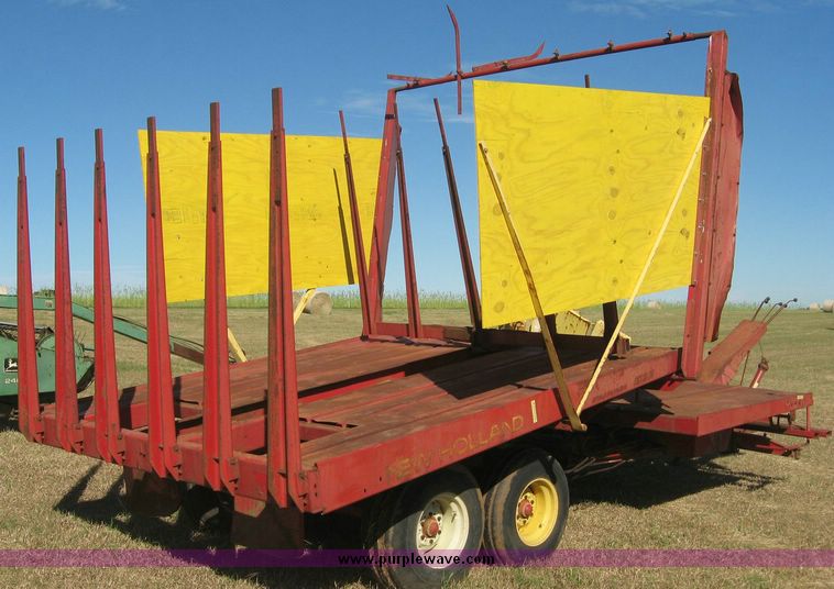 image for item 7999 New Holland 1033 pull type stack hand