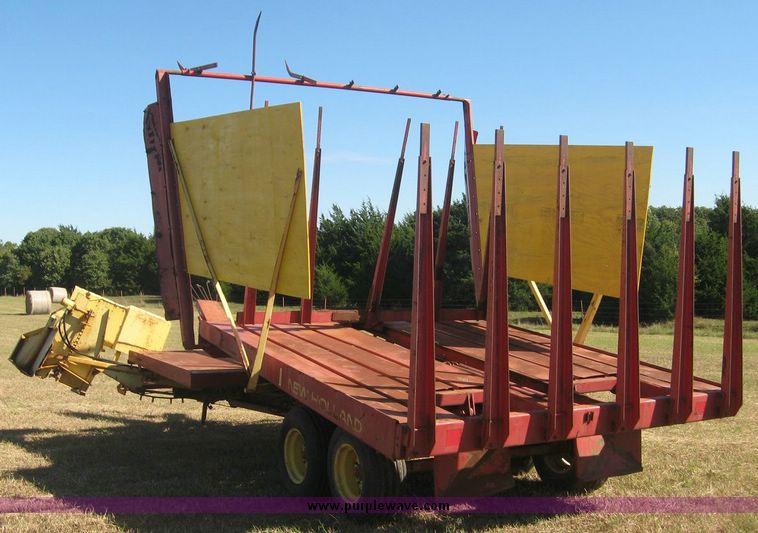 image for item 7999 New Holland 1033 pull type stack hand