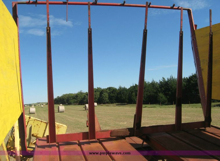 image for item 7999 New Holland 1033 pull type stack hand