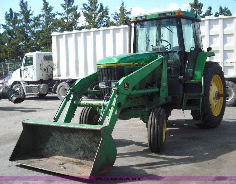 image for item 3820 1995 John Deere 7800 tractor with John Deere 725 loader