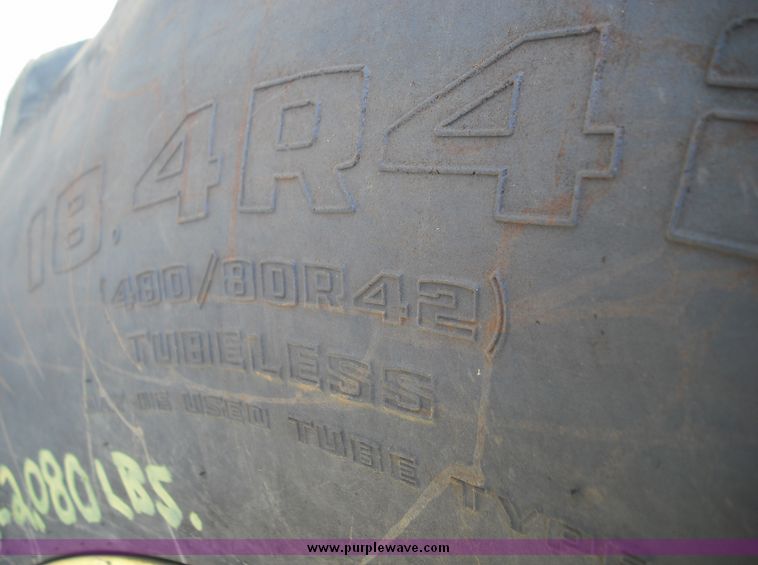 image for item 3820 1995 John Deere 7800 tractor with John Deere 725 loader