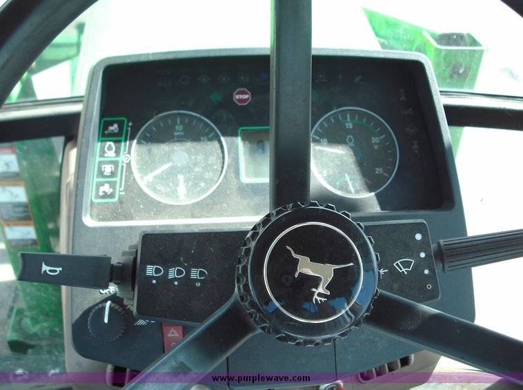 image for item 3820 1995 John Deere 7800 tractor with John Deere 725 loader