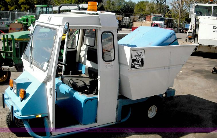 image for item 3824 1979 Cushman Truckster three wheeler with cab
