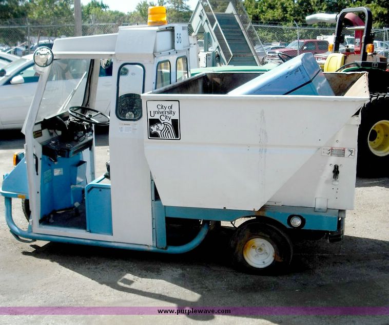 image for item 3824 1979 Cushman Truckster three wheeler with cab