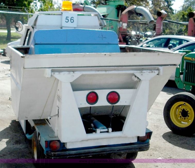 image for item 3824 1979 Cushman Truckster three wheeler with cab