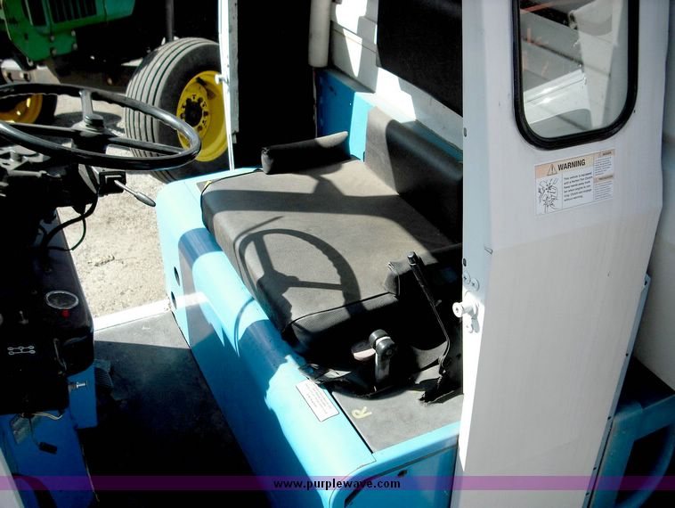 image for item 3824 1979 Cushman Truckster three wheeler with cab