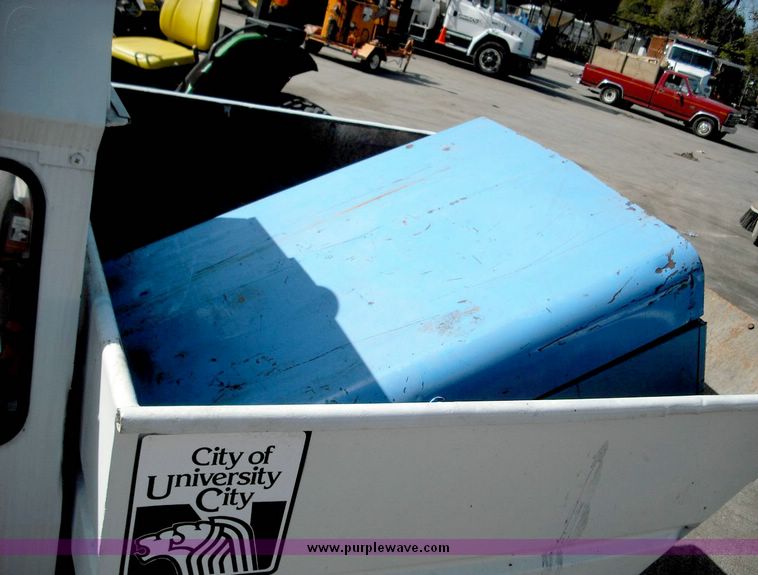 image for item 3824 1979 Cushman Truckster three wheeler with cab