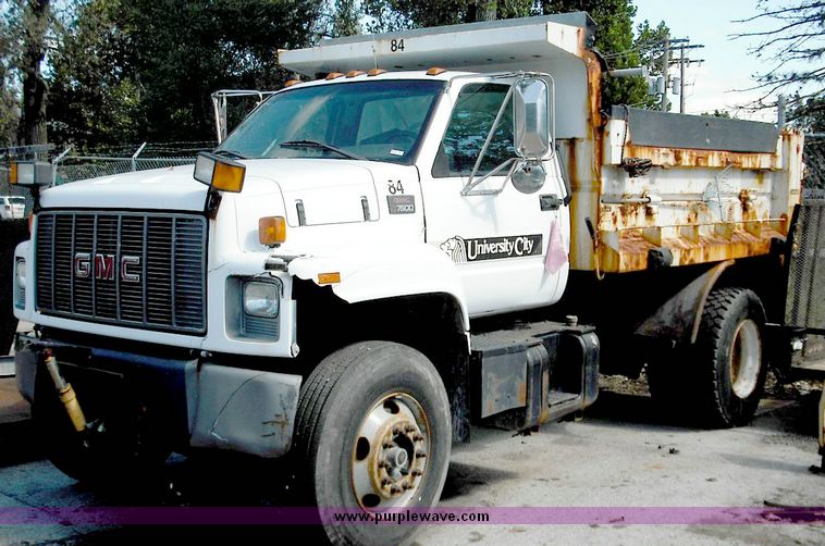 image for item 3826 2000 GMC C7500 dump truck with plow and spreader controls