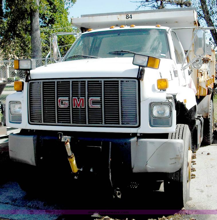 image for item 3826 2000 GMC C7500 dump truck with plow and spreader controls