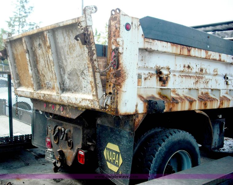 image for item 3826 2000 GMC C7500 dump truck with plow and spreader controls
