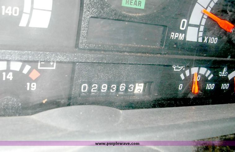 image for item 3826 2000 GMC C7500 dump truck with plow and spreader controls