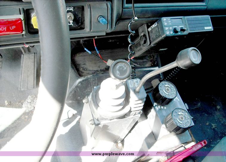 image for item 3826 2000 GMC C7500 dump truck with plow and spreader controls