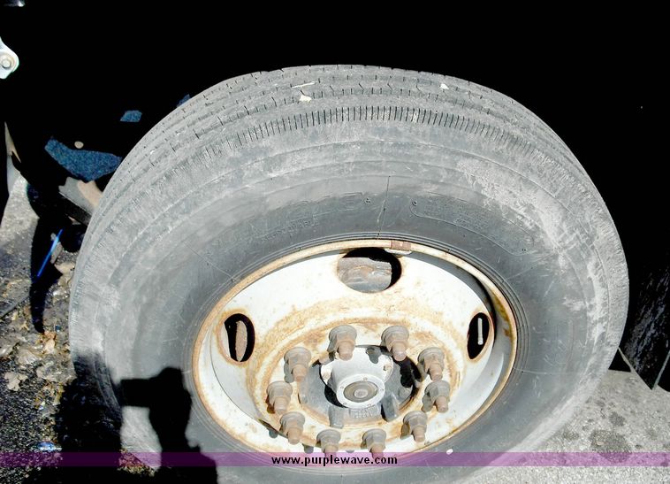 image for item 3826 2000 GMC C7500 dump truck with plow and spreader controls