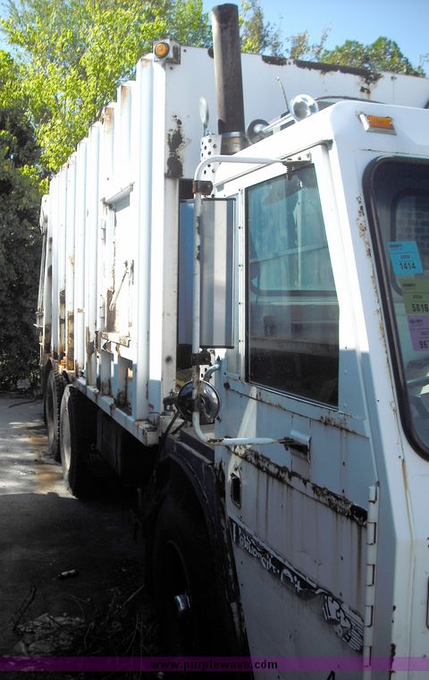 image for item 3883 1997 Crane Carrier Centurion low entry refuse truck with rear loader