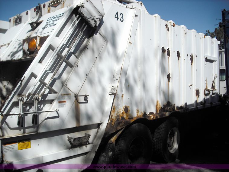 image for item 3883 1997 Crane Carrier Centurion low entry refuse truck with rear loader