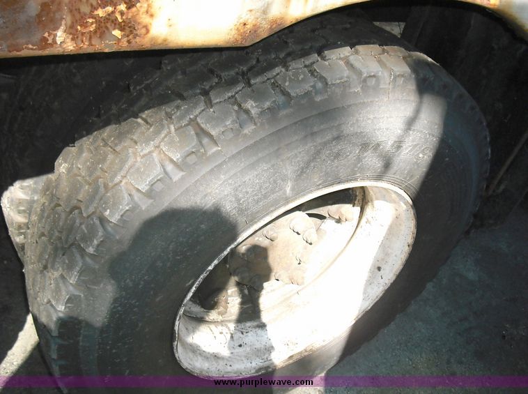 image for item 3883 1997 Crane Carrier Centurion low entry refuse truck with rear loader