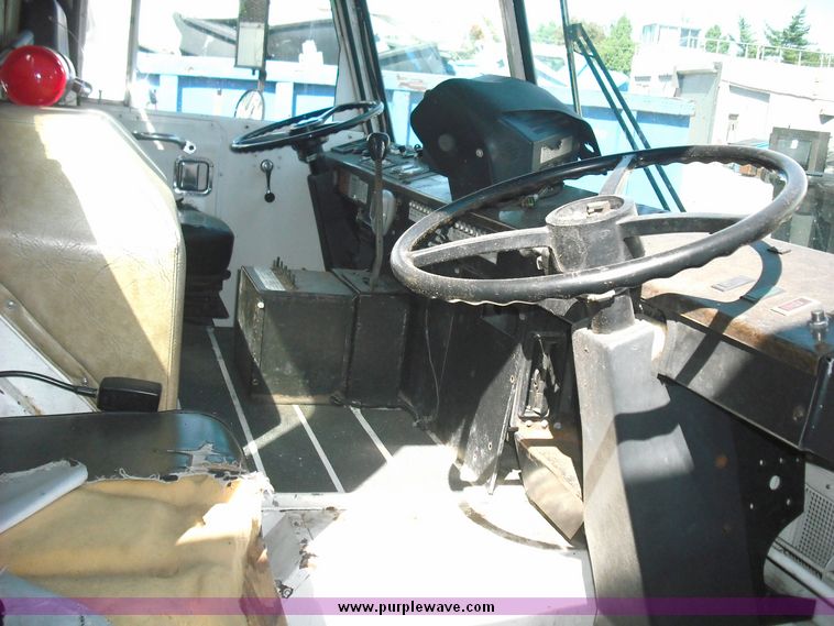 image for item 3883 1997 Crane Carrier Centurion low entry refuse truck with rear loader