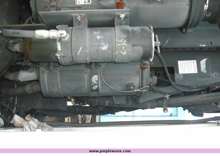 image for item 3883 1997 Crane Carrier Centurion low entry refuse truck with rear loader