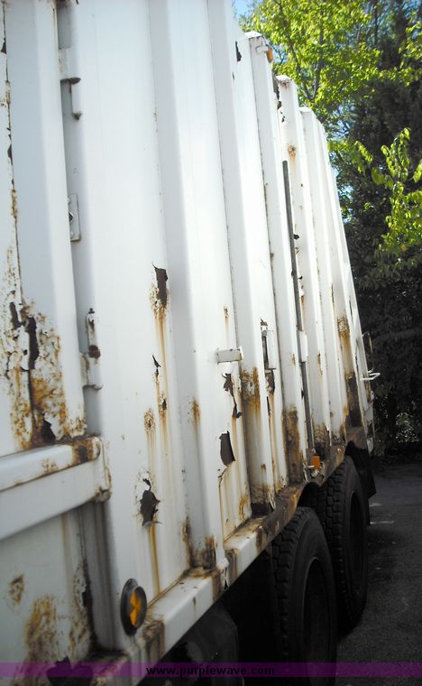 image for item 3883 1997 Crane Carrier Centurion low entry refuse truck with rear loader