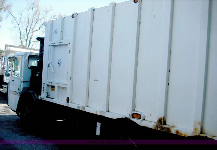 image for item 3884 1996 Crane Carrier Centurion low entry refuse truck with rear loader