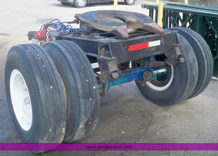 Single axle semi converter dolly in Derby, KS Item 7653 sold Purple
