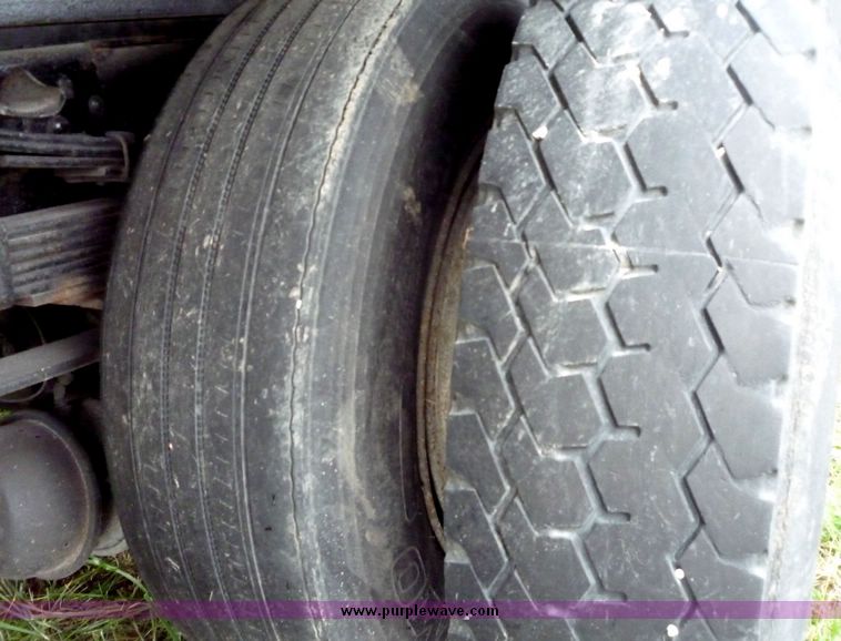 image for item 2106 1989 GMC Top Kick flatbed truck