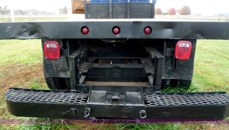 image for item 2106 1989 GMC Top Kick flatbed truck