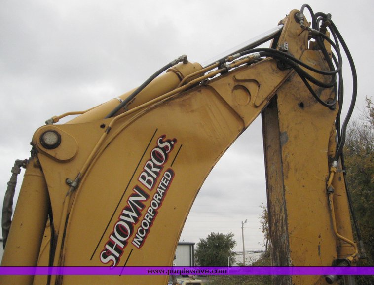 image for item 3910 1998 John Deere 410E loader backhoe