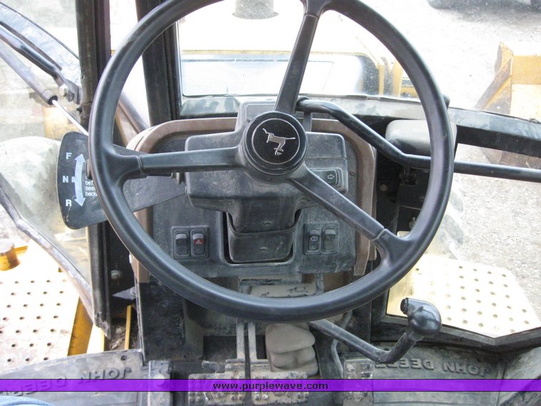 image for item 3910 1998 John Deere 410E loader backhoe