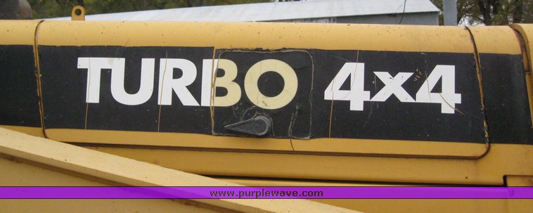 image for item 3910 1998 John Deere 410E loader backhoe