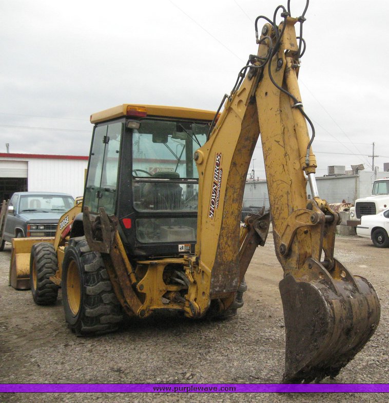 image for item 3911 1999 John Deere 310SE loader backhoe