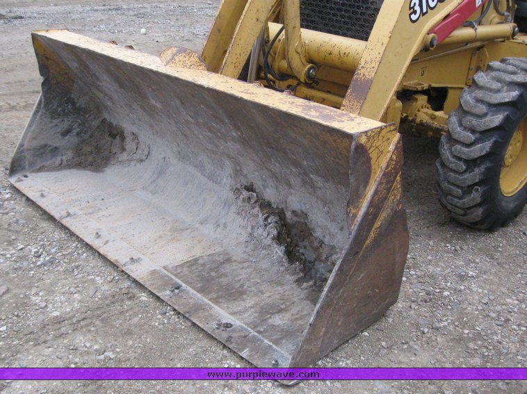 image for item 3911 1999 John Deere 310SE loader backhoe
