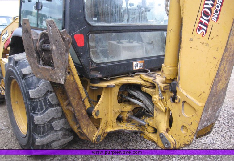 image for item 3911 1999 John Deere 310SE loader backhoe